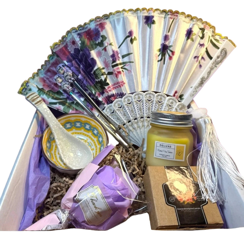 Luxury Self-Care Gift Box featuring a premium rose soap bouquet, ceramic tea set, and aromatherapy candles. 