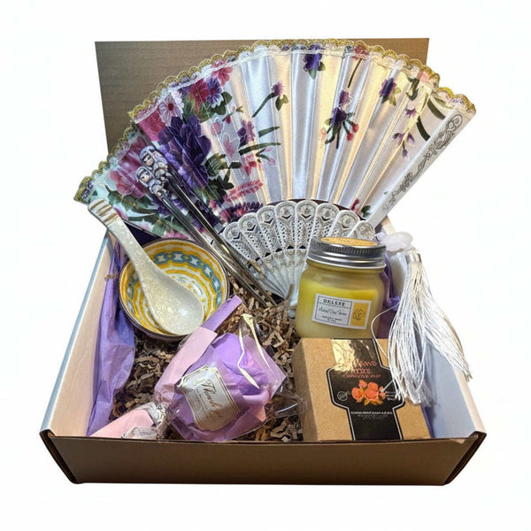 Luxury Self-Care Gift Box featuring a premium rose soap bouquet, ceramic tea set, and aromatherapy candles Curated wellness gift 