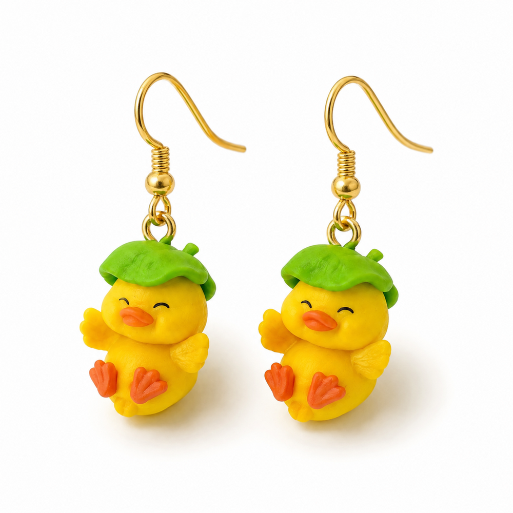 Mini yellow duck charms shown as handmade earring components for cute DIY jewelry projects