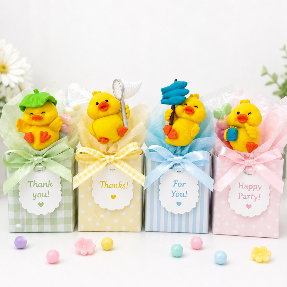 Mini yellow duck figures standing upright together on a white background
