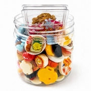Multicolor café craft supplies featuring miniature plates, baked goods, decorative figures and tiny utensils