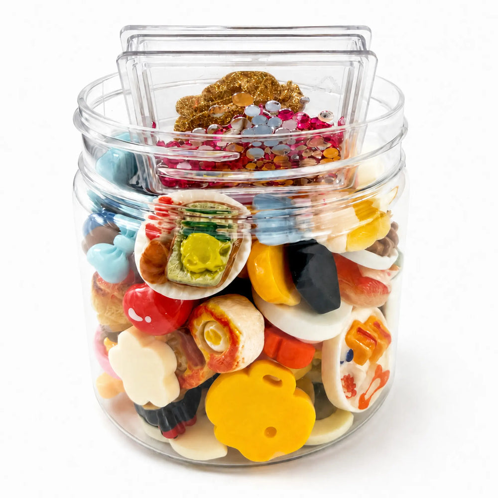 Multicolor café craft supplies featuring miniature plates, baked goods, decorative figures and tiny utensils