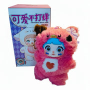 Nommi Mimi pink kawaii collectible vinyl plush with white chest and blue hair close up view