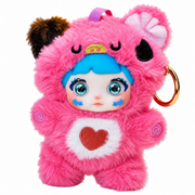 Nommi pink furry plush doll keychain with blue-green eyes, white chest patch, embroidered heart, and original blind box packaging.