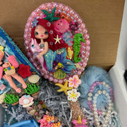 Ocean-inspired gift basket for girls with mermaid hair brush, clay bow, earrings and lip gloss