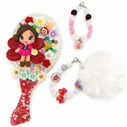 Pearl trimmed floral hand mirror with sparkling red handle, beaded charm and white pom pom accessory