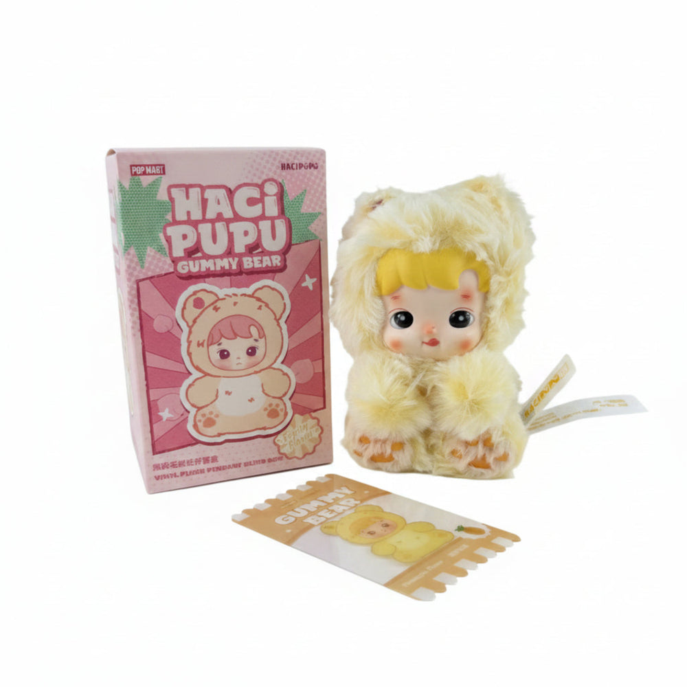 Pineapple Flurry HACIPUPU plush pendant with soft yellow faux fur and vinyl face