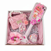 Pink decorated hari brush with doll porcelain doll, hair accessories, and handbag pink