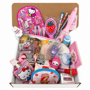 Pink strawberry gift basket with stationery, beauty treats, hair accessories, socks and pouches