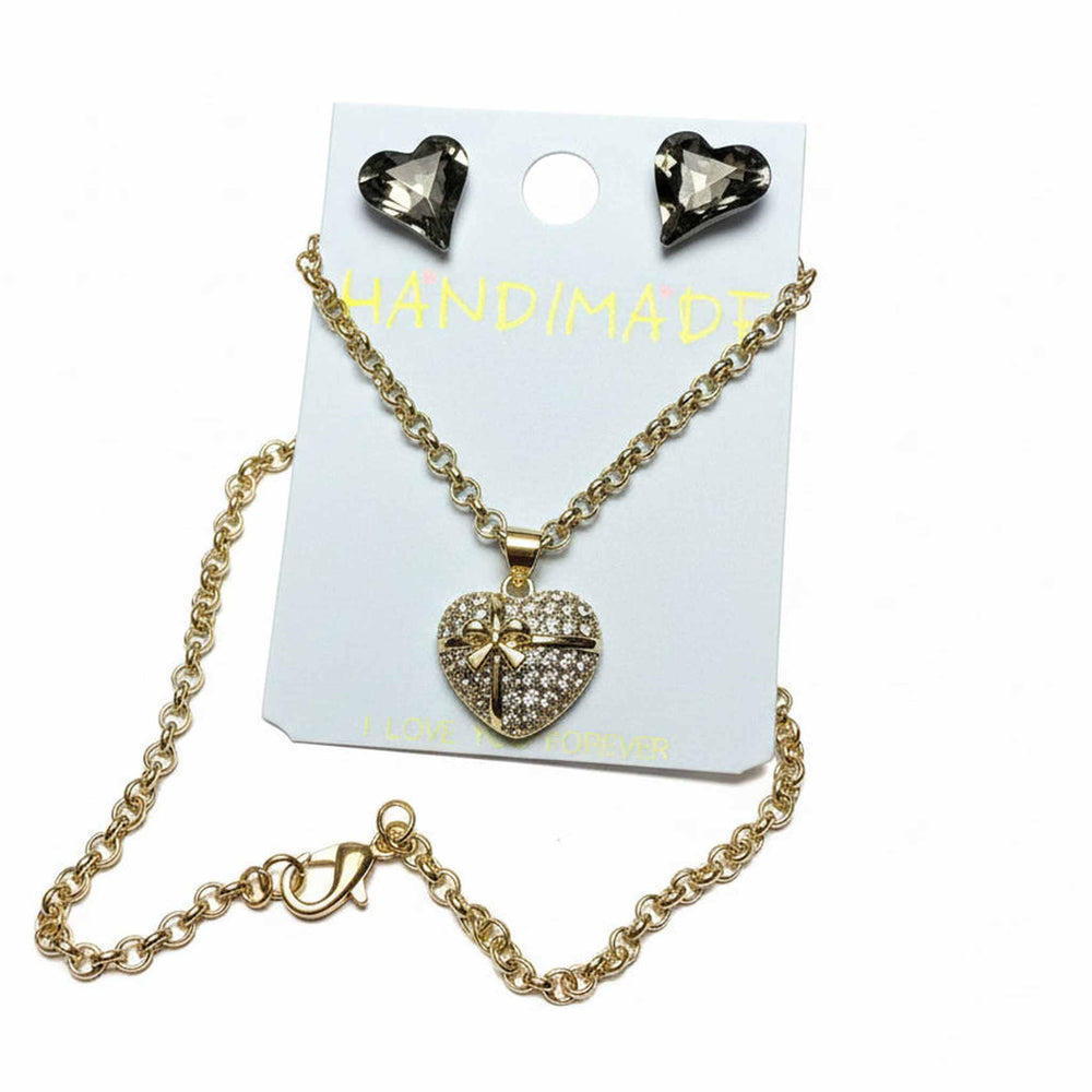 Premium gift packaging for heart crystal jewelry set - white box and black luxury bag from Miami boutique
