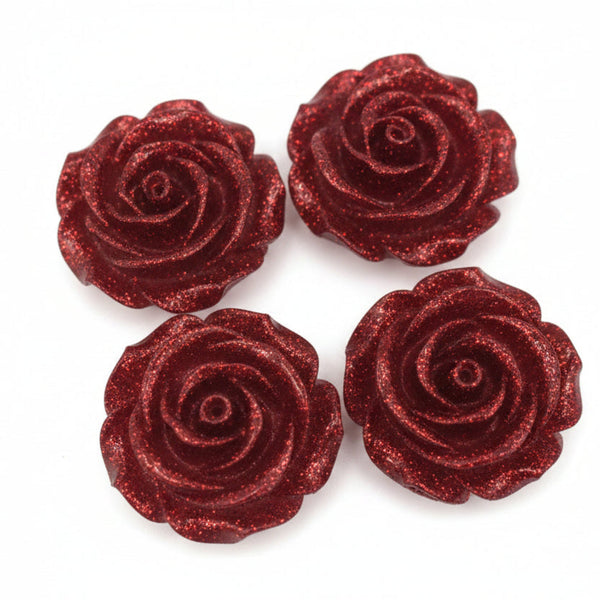 Red glitter rose flatback cabochons, set of 4 resin craft embellishments on a white background