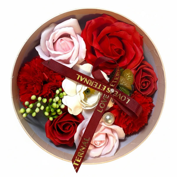 Rose petal soap gift box with red, pink and white floral soaps and red ribbon