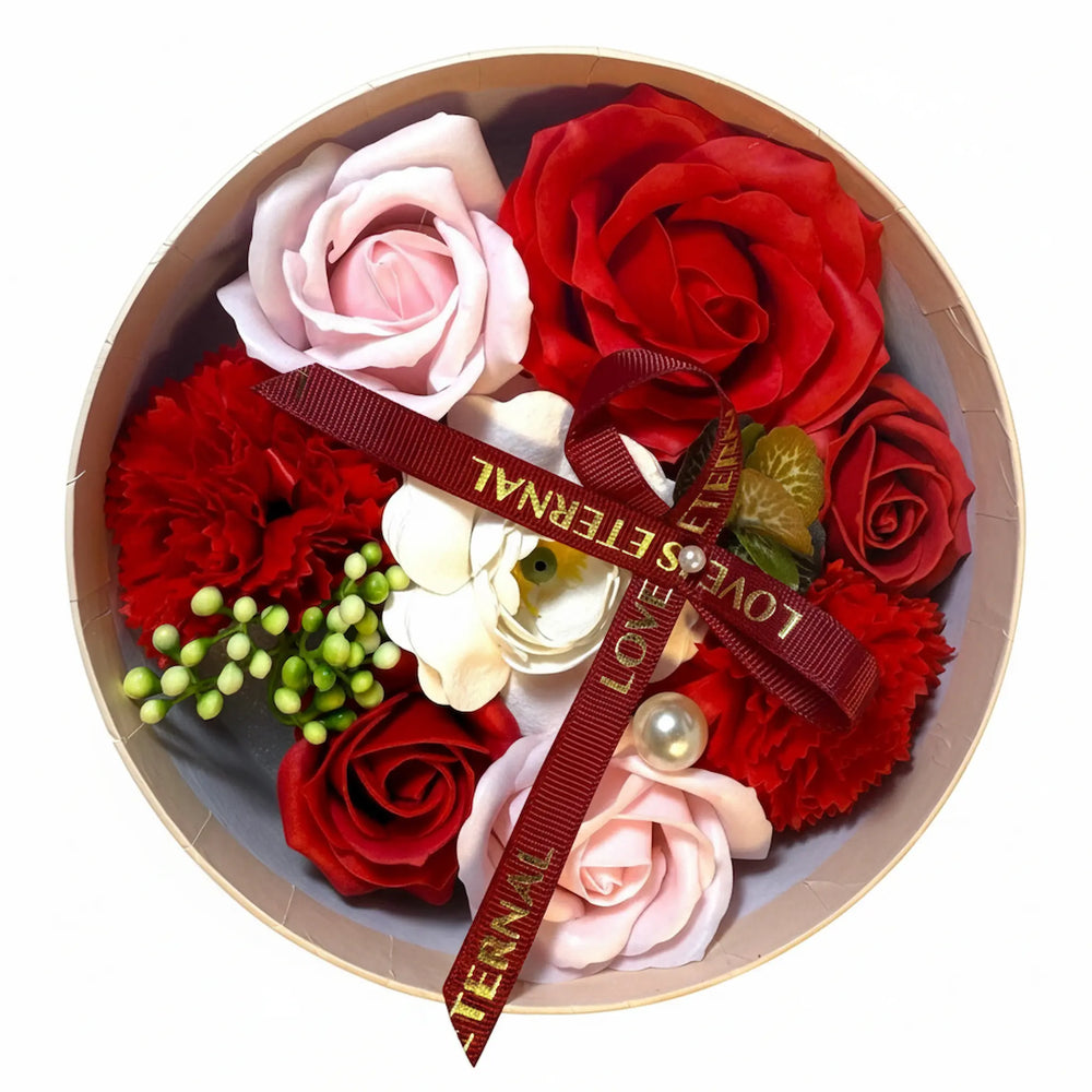 Rose petal soap gift box with red, pink and white floral soaps and red ribbon