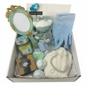 Self-care gift set with vintage-style mirror, bath bombs, anklet, earrings, candle, handmade soap and teddy bear towel