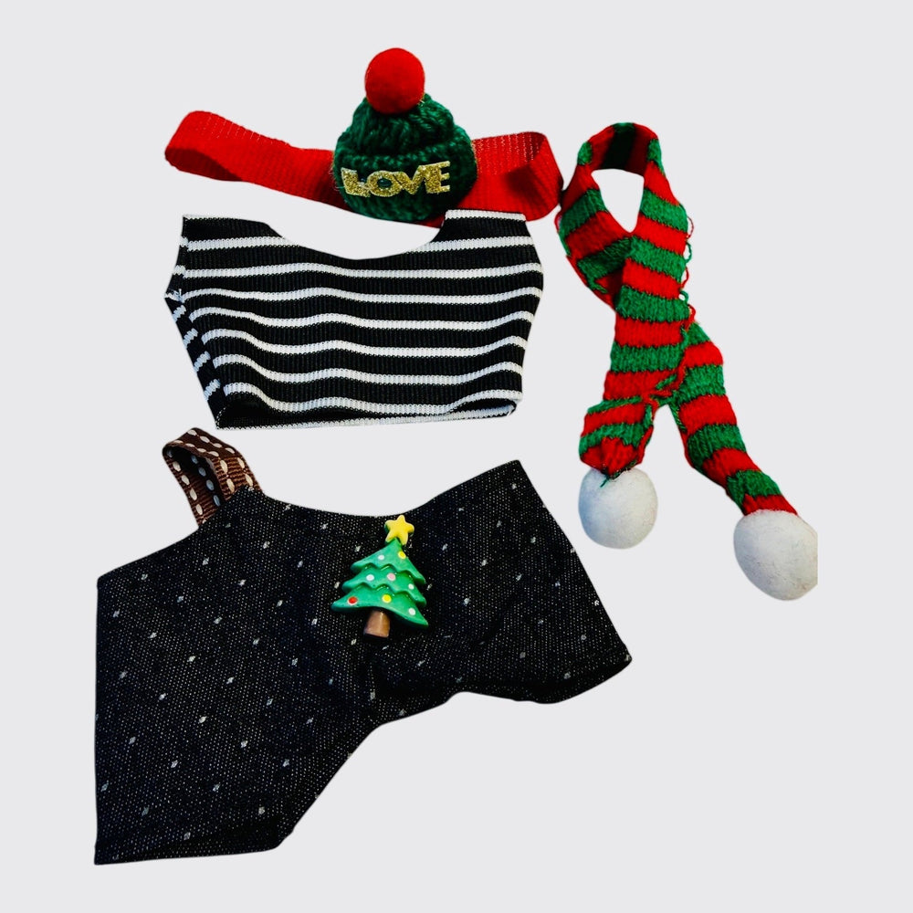 Set of Christmas-themed clothing for 17 cm doll,  items including a striped crop top, black shorts with a tree design, red and green striped scarf, and green beanie with pom-pom headband