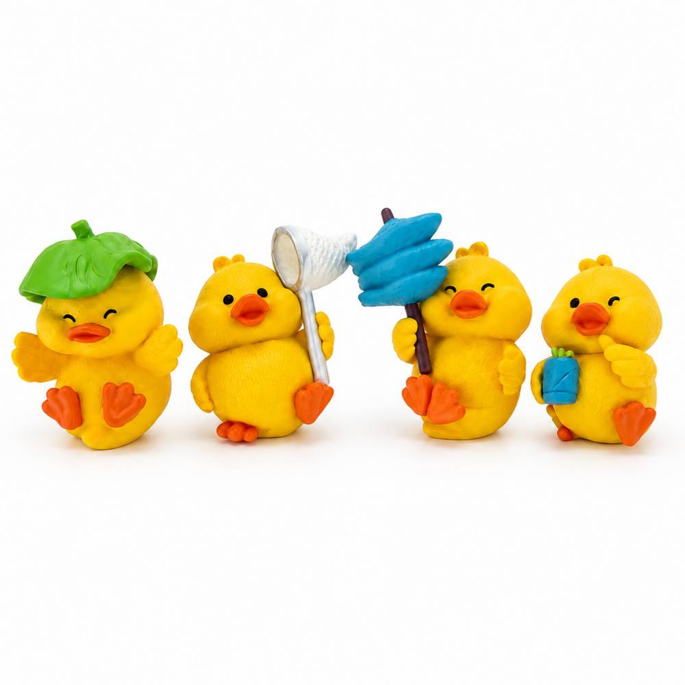 Set of four mini yellow duck charms for decorated pens, jewelry making and creative crafts