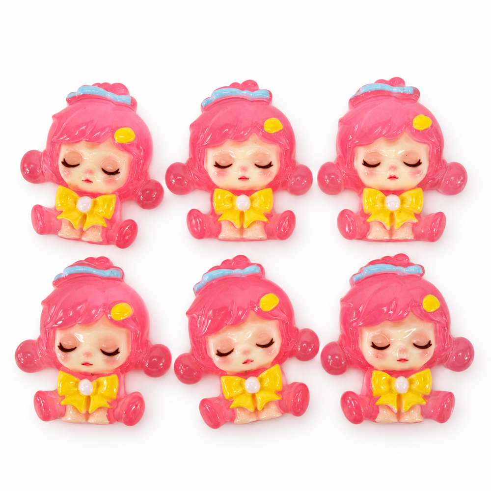 Six pink Sleepy Doll resin flatbacks with yellow bows and blue headbands.