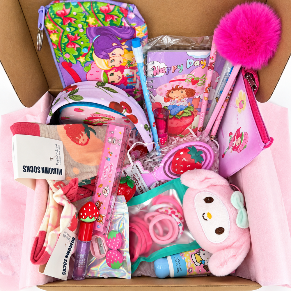 Strawberry-themed gift box with colorful stationery, pink beauty accessories, socks, pouches, hair items, and plush character accessory.