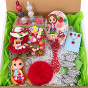 Strawberry-themed handmade vanity set with decorated pen holder, jeweled pens, floral mirror, and colorful doll details.