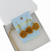 Unique rose jewelry gift featuring handmade floral earrings and matching necklace for women