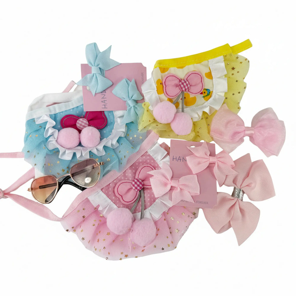 XS dog wearing fluffy tutu, sunglasses and matching bows from Pet Princess Accessories Set