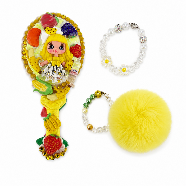 Yellow fruit theme decorated hand mirror with clay doll, strawberries, bananas and sparkling yellow accents