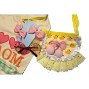 Yellow tustu , pink bows, sunglasses,  on a white background