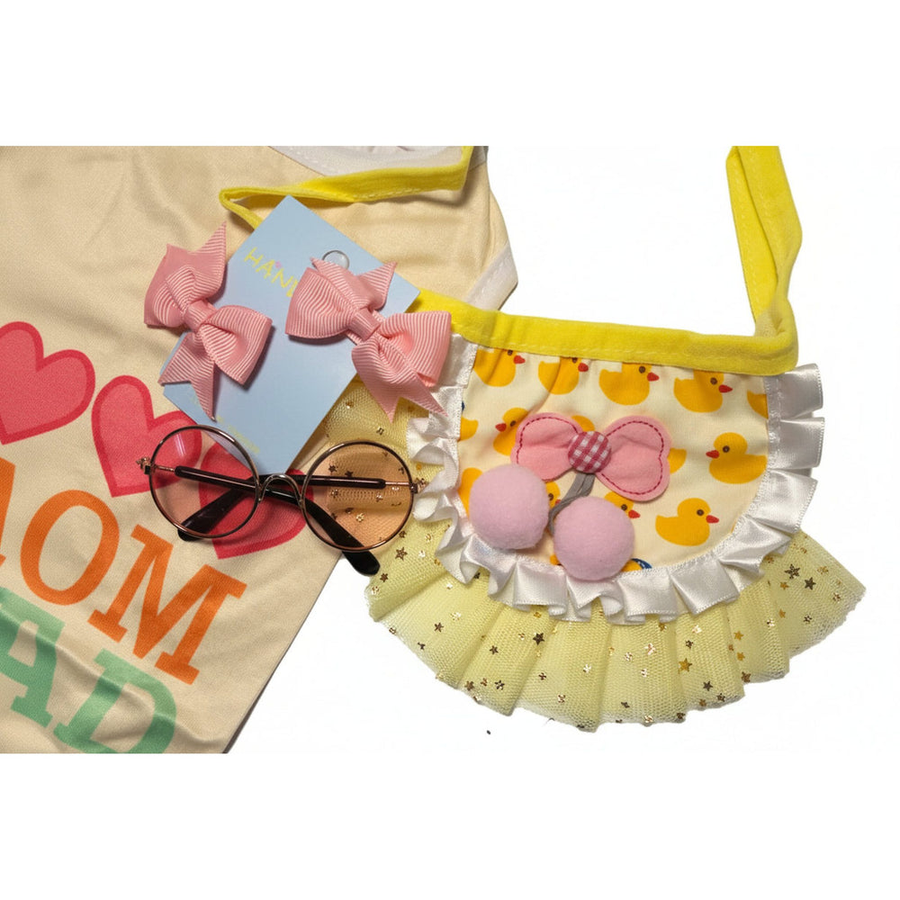 Yellow tustu , pink bows, sunglasses,  on a white background