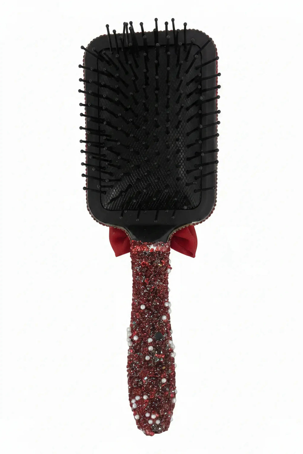 back view of black hair brush from kawaii porcelain doll gift set