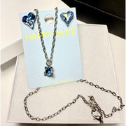 cat pendant necklace and crystal earrings silver tone jewelry 
