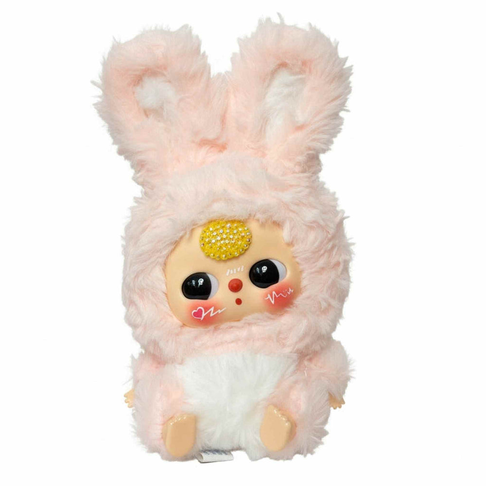 close-up of baby three yellow plush doll with yellow crystal bedazzled