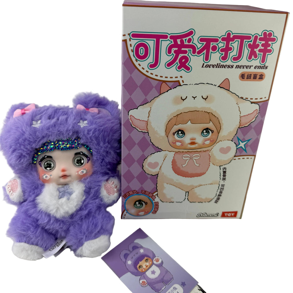 close-up of nommi bear plush covered in hand-applied purple crystal accents, ultra-soft polyester body kawaii gift