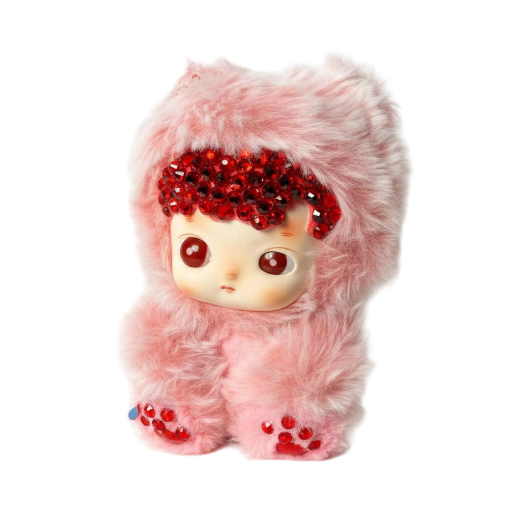 close-up of pink hacipupu plush with sparkling red crystals 