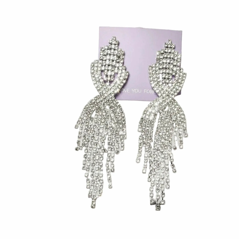 close-up of sparkling silver-tone teardrop earrings 