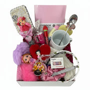 coquette gift basket for women with decorated hair brush, ceramic mug, notebook and compact mirror