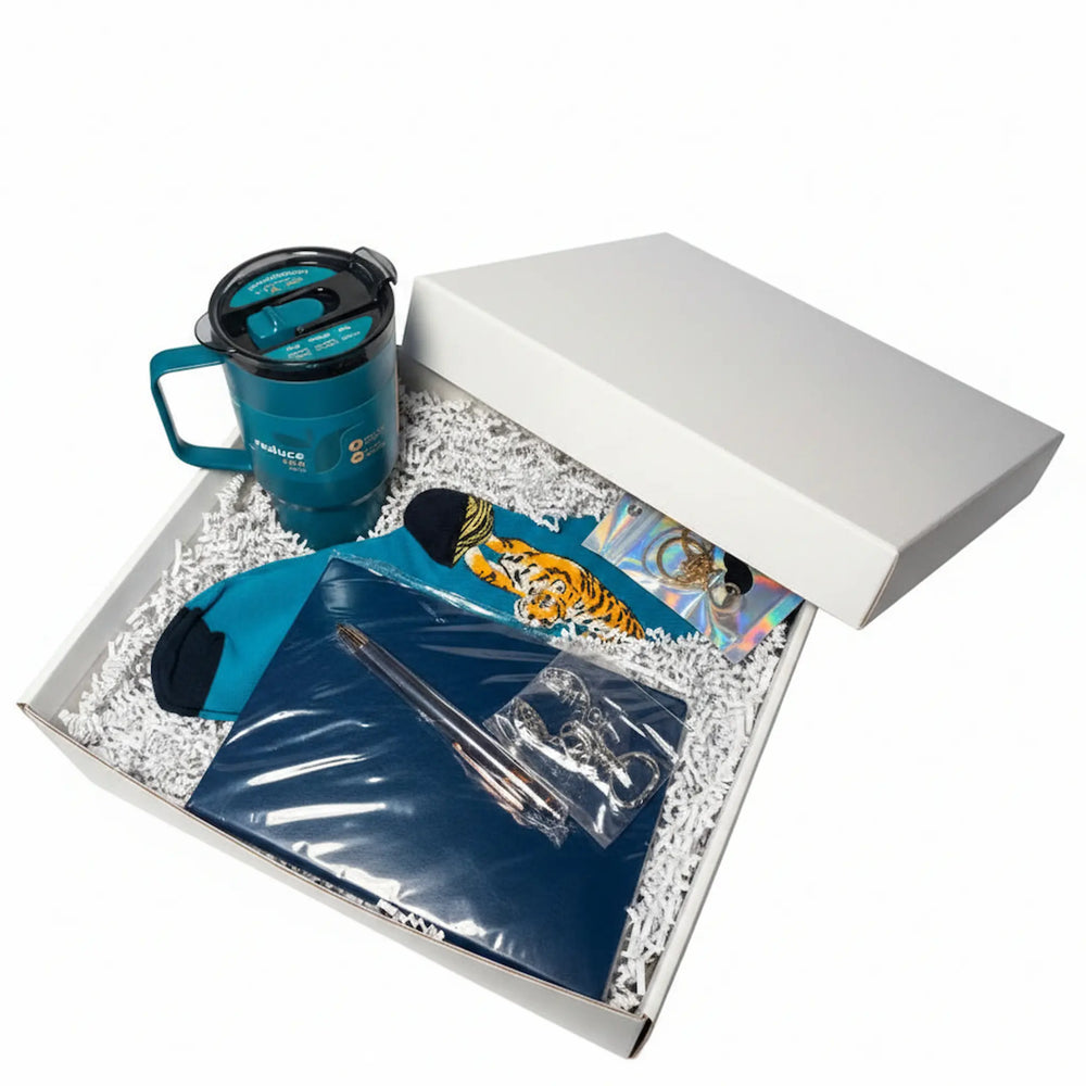 curated men's gift box with rare finds, premium accessories and lobster bottle opener