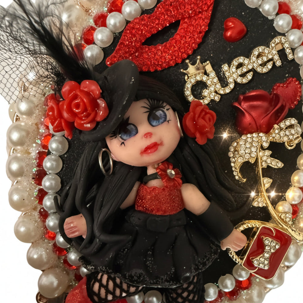 decoden hand mirror close up with porcelain doll face peeking from dreamy floral design