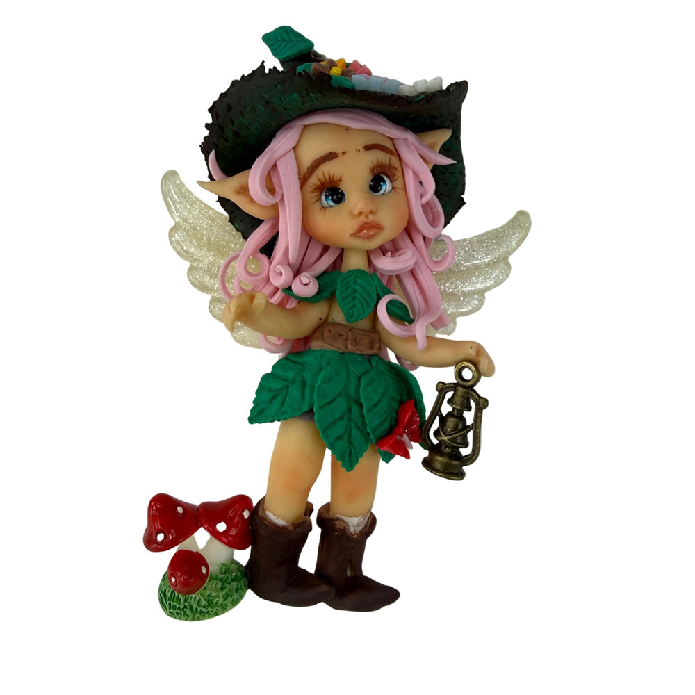 flatback flexible porcelain fairy figure with wings and mushroom showing clean design for diy hair bows