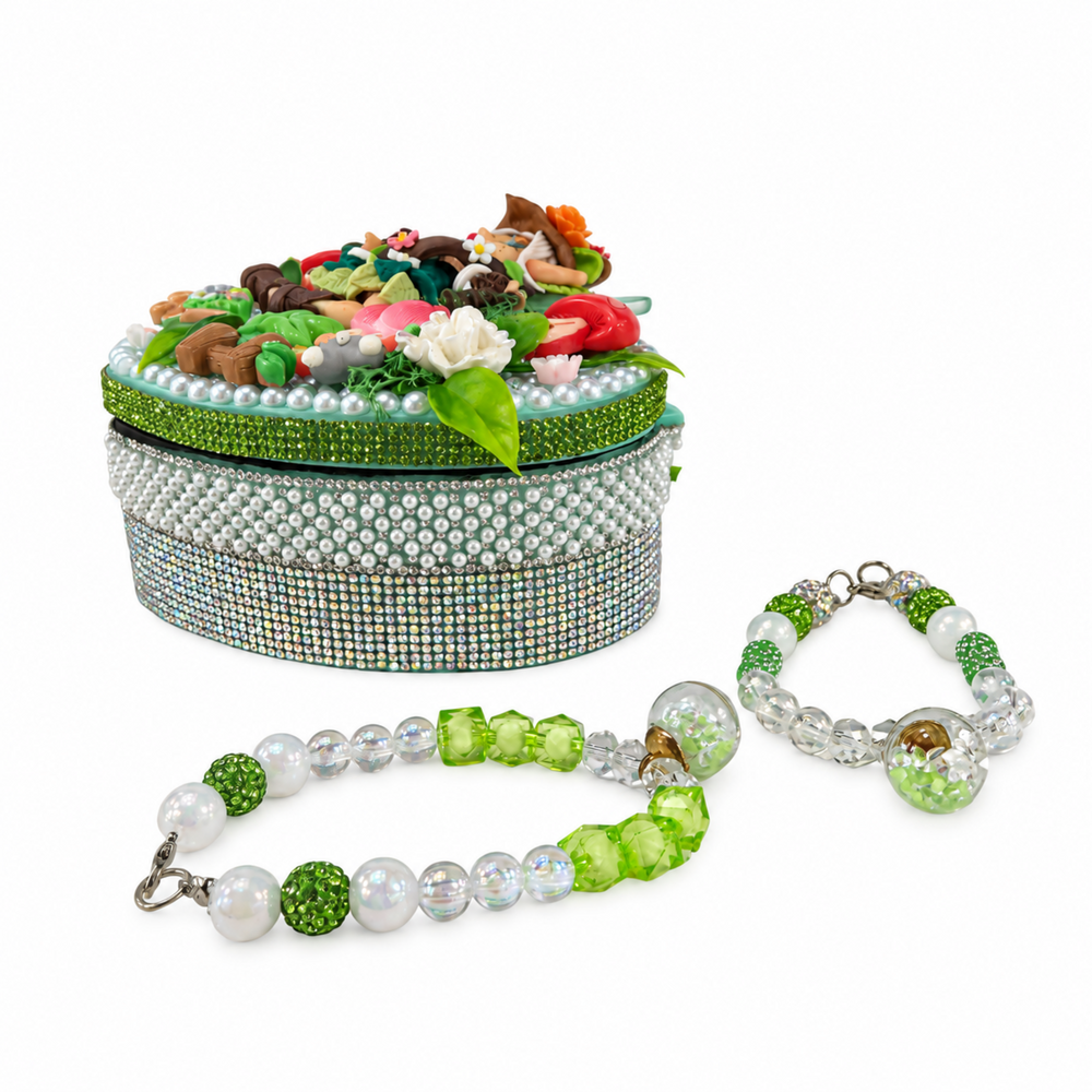 forest heart jewelry box with green beaded bracelets
