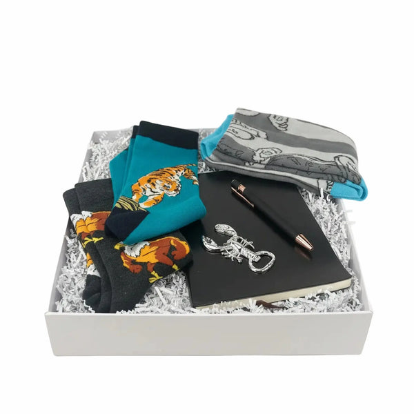 gift set for men with tiger and eagle novelty socks, silver lobster bottle opener and black notebook