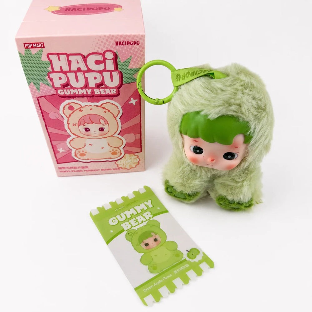 Cute green Hacipupu plush pendant keychain with matching card and packaging