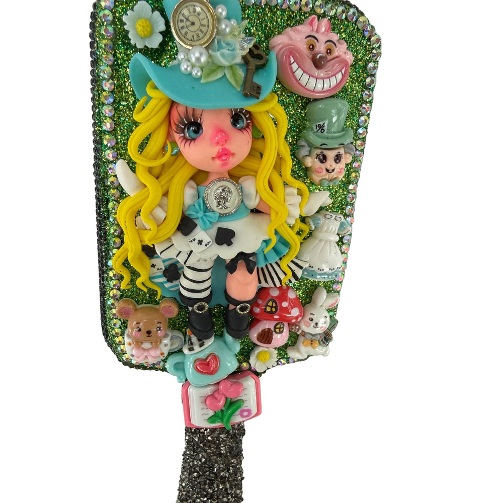 handmade hairbrush decorated with black rhinestones and flex porcelain doll