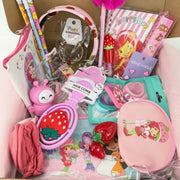 kawaii girl gift set with 22 pieces including stationery, lip gloss, charm bracelet, earrings and hair accessories