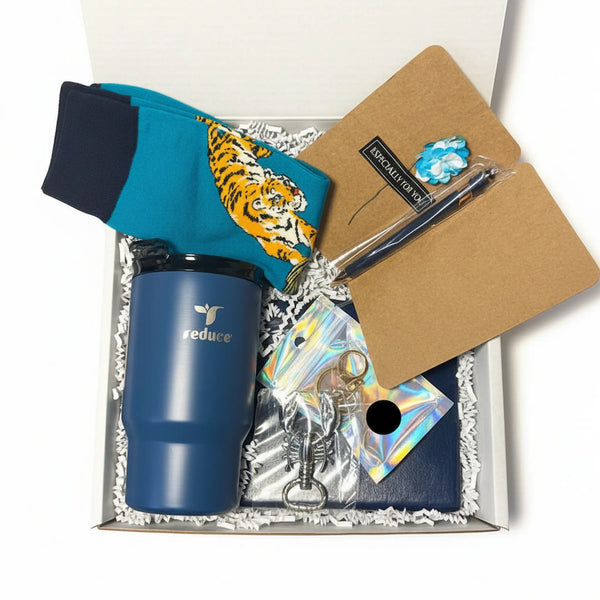 luxury men's gift box with blue stainless steel tumbler, exotic keychain and executive notebook