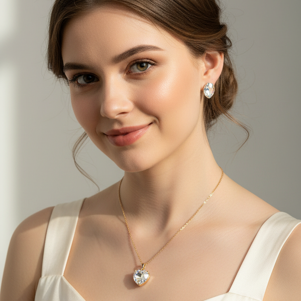 Model wearing the handmade crystal pendant necklace and matching sparkling crystal earrings from the Majestic collection