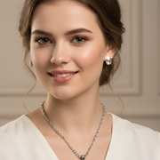 Elegant model wearing a handmade crystal necklace and matching sparkling crystal earrings