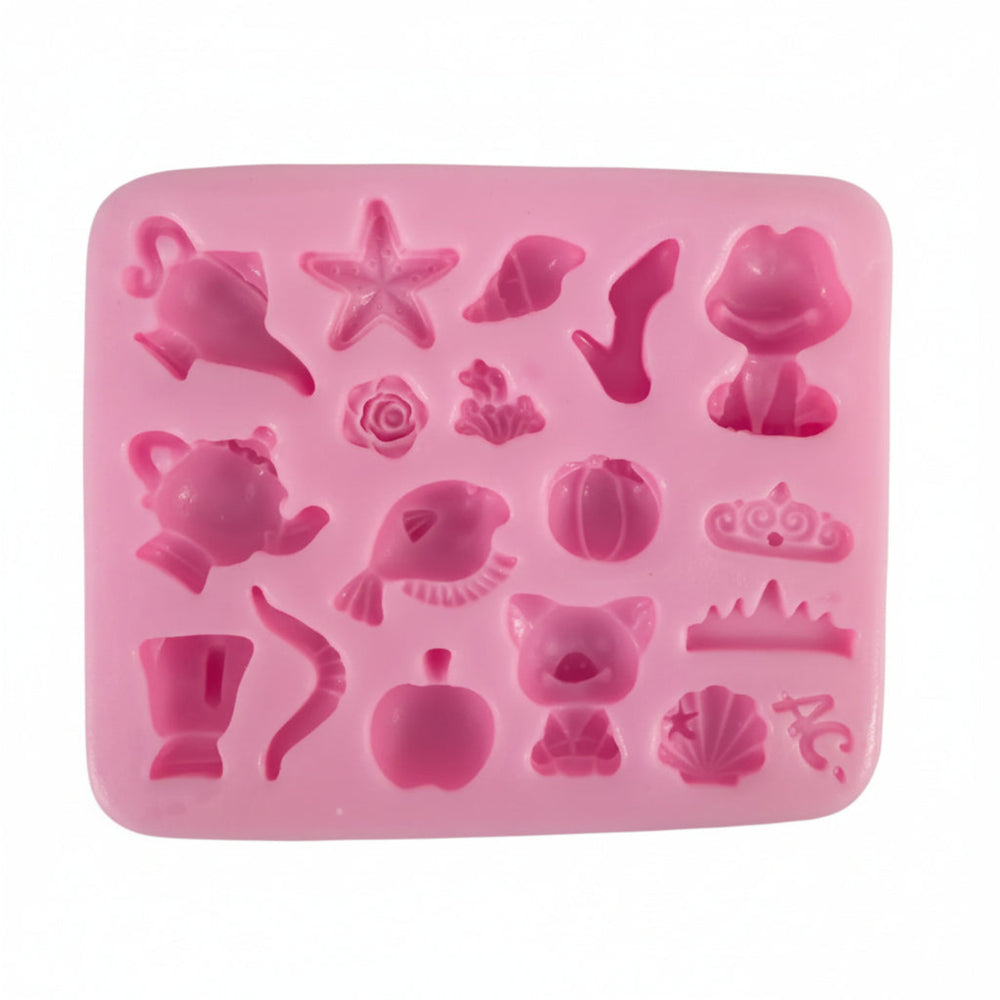 multi-cavity silicone mold for resin and clay casting featuring miniature apple, pumpkin, seashell, and fish shapes