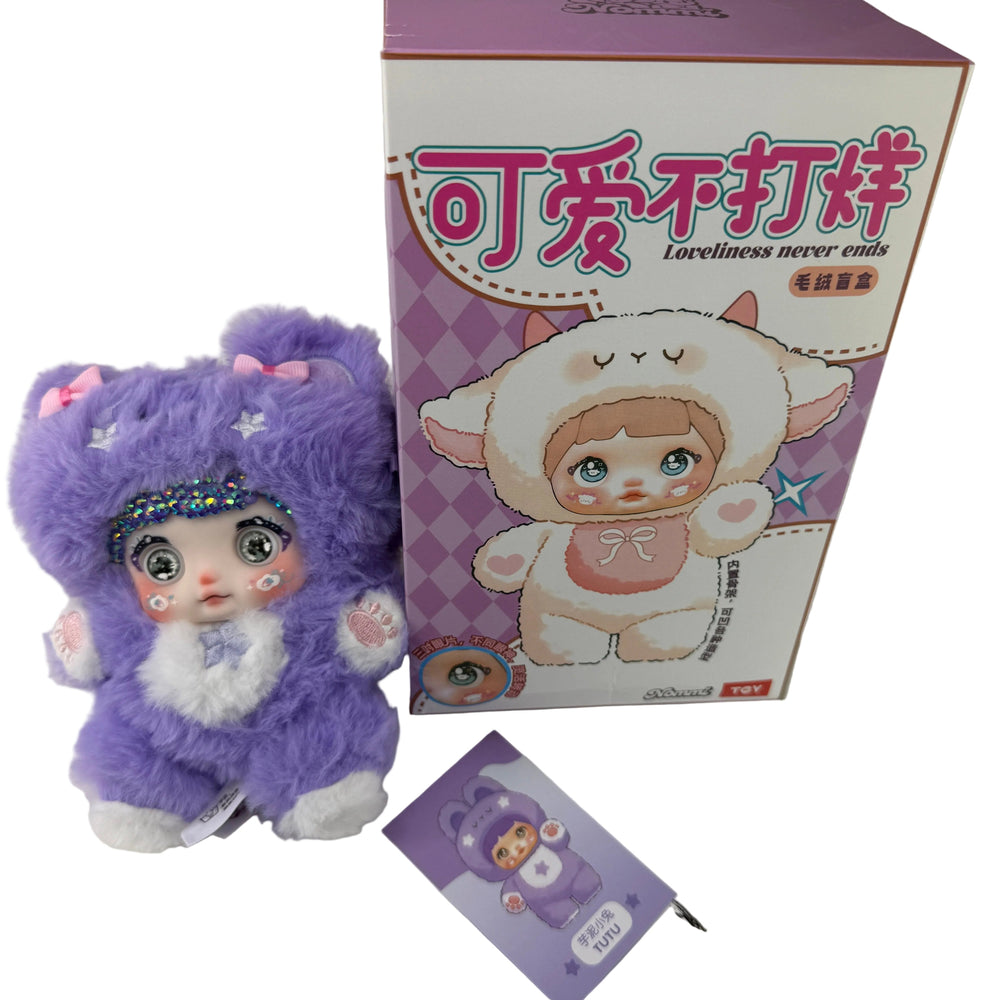 nommi purple hand-bedazzled plush pendant with shimmering crystal finish, kawaii collectible for bag or display