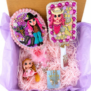 pink cowgirl gift box with decorated mirror hair brush jewelry and handmade doll