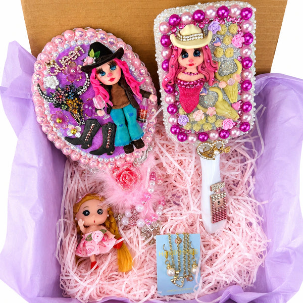 pink cowgirl gift box with decorated mirror hair brush jewelry and handmade doll
